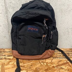 JanSport Classic Black Backpack with Brown Accents